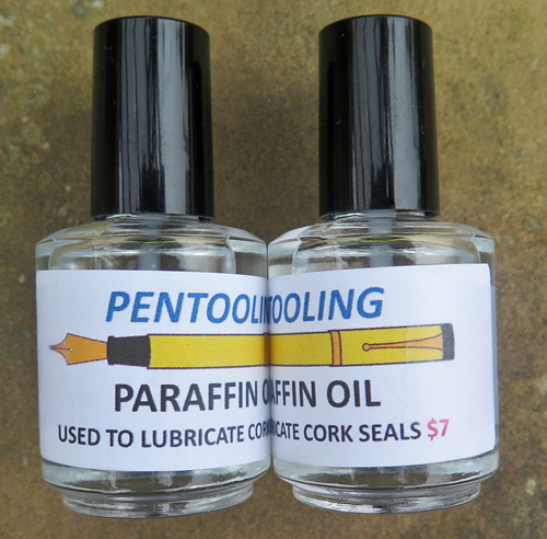 PARAFFIN OIL: USED TO LUBRICATE WOODEN CORK SEALS